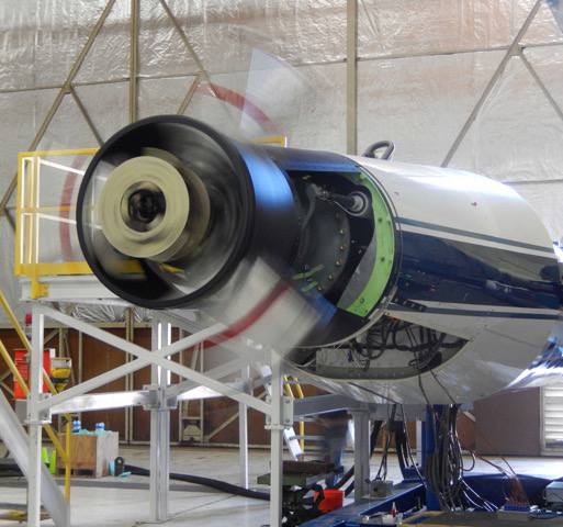 TTR spin test with dummy blade grips (silver with red stripes) to check rotor controls and instrumentation.